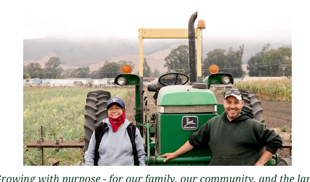 Tierra H&R farmers beside a tractor